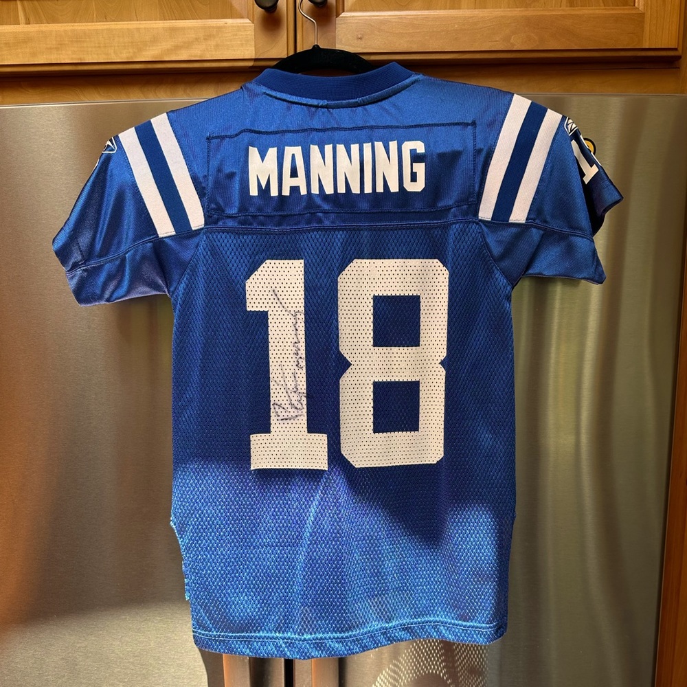 Signed Peyton Manning Jersey after winning 2007 Super Bowl - priceless!